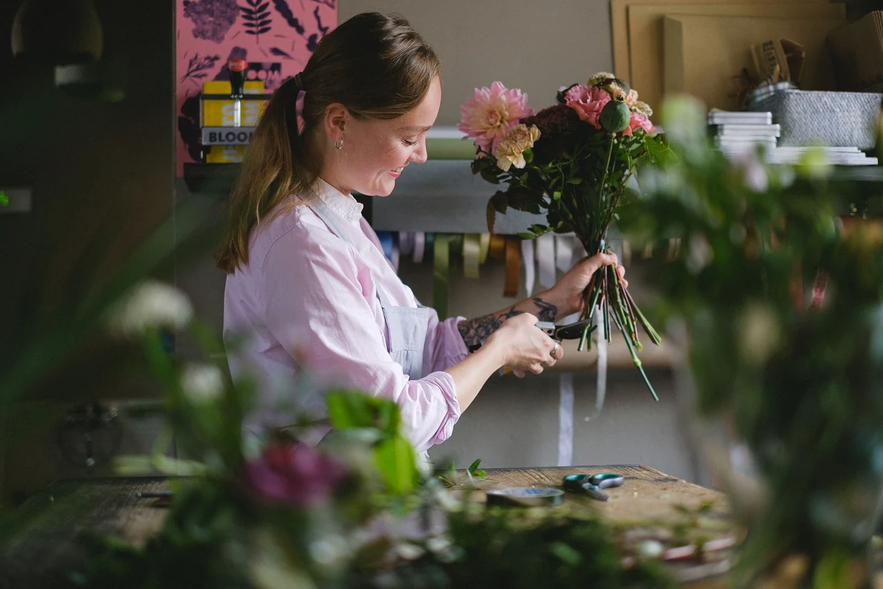 Florist carefully preparing flowers for delivery in Settat